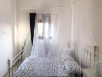 A bed or beds in a room at Affittimoderni Avola La Perla