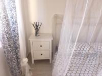 A bed or beds in a room at Affittimoderni Avola La Perla