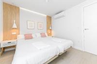 Posteľ alebo postele v izbe v ubytovaní WintowinRentals Exclusivo ático cerca de la playa.