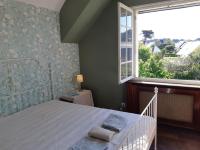Posteľ alebo postele v izbe v ubytovaní Maison bord de mer