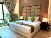 SANDY GARDEN RESORT LANGKAWIにあるベッド