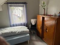 Postel nebo postele na pokoji v ubytování Holiday home Brandasund II