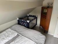 Postel nebo postele na pokoji v ubytování Holiday home Brandasund II