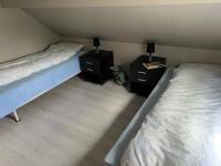 Postel nebo postele na pokoji v ubytování Holiday home Brandasund II