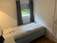 Postel nebo postele na pokoji v ubytování Holiday home Brandasund II