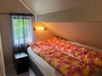 Postel nebo postele na pokoji v ubytování Holiday home Brandasund II