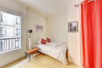 Łóżko lub łóżka w pokoju w obiekcie Appartement Groult - Welkeys