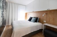 Posteľ alebo postele v izbe v ubytovaní Flatbook - City Center SPA Apartments Toruńska