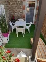 Patio lub wspólna przestrzeń na świeżym powietrzu w obiekcie LE RUN AR MOR 22