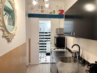 A kitchen or kitchenette at Twenty2 Apartment