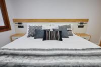 Łóżko lub łóżka w pokoju w obiekcie HAVANAAPARTAMENTOS