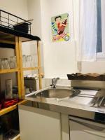 Kuchyňa alebo kuchynka v ubytovaní Habitation CASSIOPEE