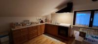 A kitchen or kitchenette at La Mia Mansardina