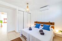 A bed or beds in a room at Villa Samui