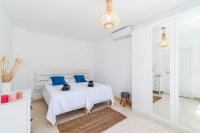 A bed or beds in a room at Villa Samui