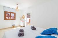 A bed or beds in a room at Villa Samui