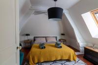 Posteľ alebo postele v izbe v ubytovaní La maison de Gabin et Augustin