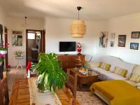 Televízia a/alebo spoločenská miestnosť v ubytovaní Tranquila casa rural en el centro de Fuerteventura