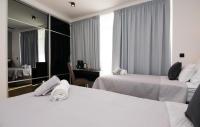 Posteľ alebo postele v izbe v ubytovaní Sky & Sun Luxury Rooms with private parking in the garage
