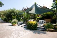 A garden outside Hotel Gemma Del Mare