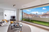 Telewizja i/lub zestaw kina domowego w obiekcie Exclusive Penthouse & terrace by ELE Apartments