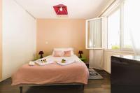 Katil atau katil-katil dalam bilik di Le Monjuzet - Joli T2 avec petite terrasse confort, proche du centre ville