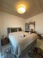 A bed or beds in a room at Apartmán FREYA