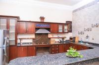 A kitchen or kitchenette at Tomorrow Land villa