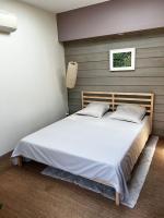 Łóżko lub łóżka w pokoju w obiekcie Maisonnette de charme aux portes d'Hossegor