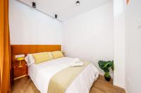 Łóżko lub łóżka w pokoju w obiekcie Exclusive Alameda - Prime Area