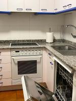 Kuchyňa alebo kuchynka v ubytovaní Apartamento Edificio Cunchas