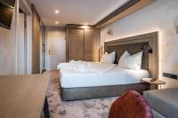 Posteľ alebo postele v izbe v ubytovaní Hotel Gasthof Brücke