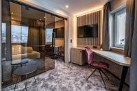 Televízia a/alebo spoločenská miestnosť v ubytovaní Hotel Gasthof Brücke