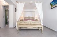 Posteľ alebo postele v izbe v ubytovaní Beachside Bungalows