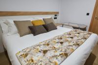 Łóżko lub łóżka w pokoju w obiekcie HAVANAAPARTAMENTOS
