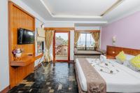 Postel nebo postele na pokoji v ubytování Karona Resort & Spa - SHA Extra Plus