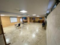 Una televisión o centro de entretenimiento en Spa Hotel Ciudad de Teruel
