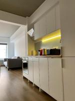 A kitchen or kitchenette at Mosaikon Guesthouses #Nikiou Str