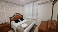 Postel nebo postele na pokoji v ubytování Apartamentos Los Robles