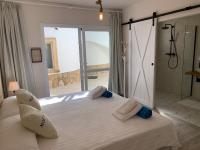 Postel nebo postele na pokoji v ubytování Villa Palmview Up To 28 Guests Close To Jávea Beach