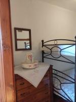 Posteľ alebo postele v izbe v ubytovaní Athena's Guest House