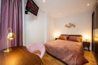 London Nino Apartmentsにあるベッド