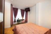 London Nino Apartmentsにあるベッド