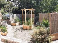 Ogród w obiekcie Châteaudouble : appartement au calme