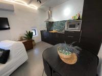 A kitchen or kitchenette at La Martela de Fuentes Casa de diseño rural