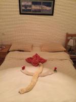 Postel nebo postele na pokoji v ubytování L'Oasis de Safaga Hotel