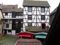 a view of a building with a group of buildings at La cour des meuniers - le Froment et l&#39;Epeautre in Kaysersberg