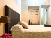 Postel nebo postele na pokoji v ubytování Apartamento Málaga Centro Tritón