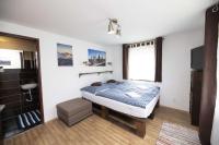 Postel nebo postele na pokoji v ubytování Chata Orlik - all inclusive & wellness
