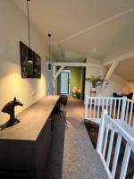 Łóżko lub łóżka w pokoju w obiekcie DUPLEX AVENUE ROYALE